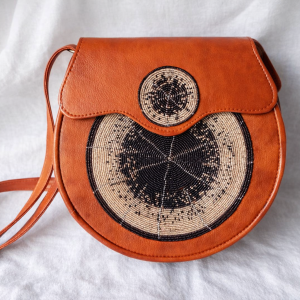 Maasai beaded leather crossbody bag in circular beadwork design
